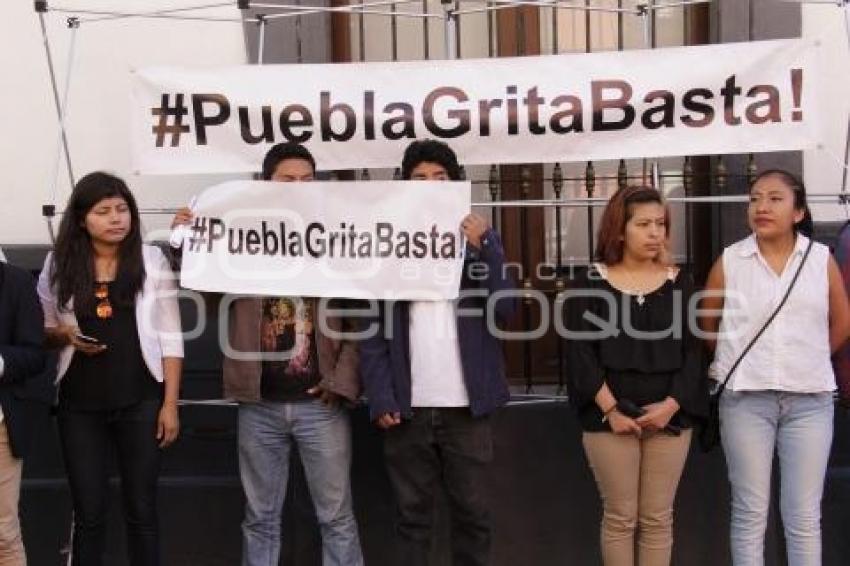 PUEBLA GRITA BASTA