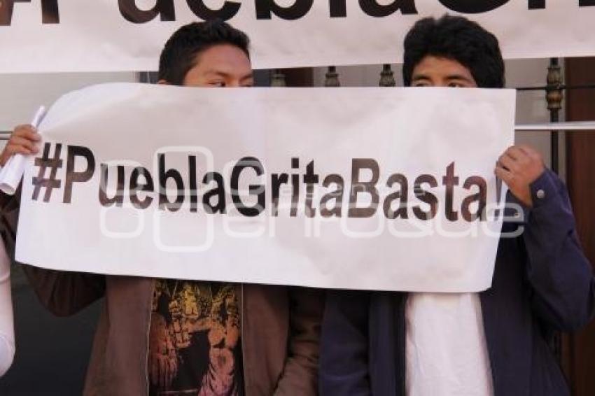 PUEBLA GRITA BASTA