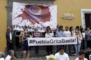 PUEBLA GRITA BASTA