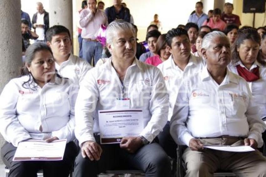 PREMIO AL MÉRITO