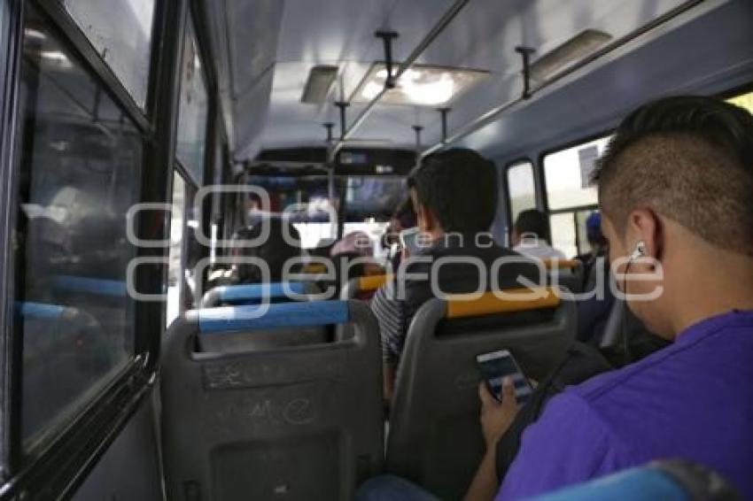 TRANSPORTE PÚBLICO . VIDRIOS POLARIZADOS