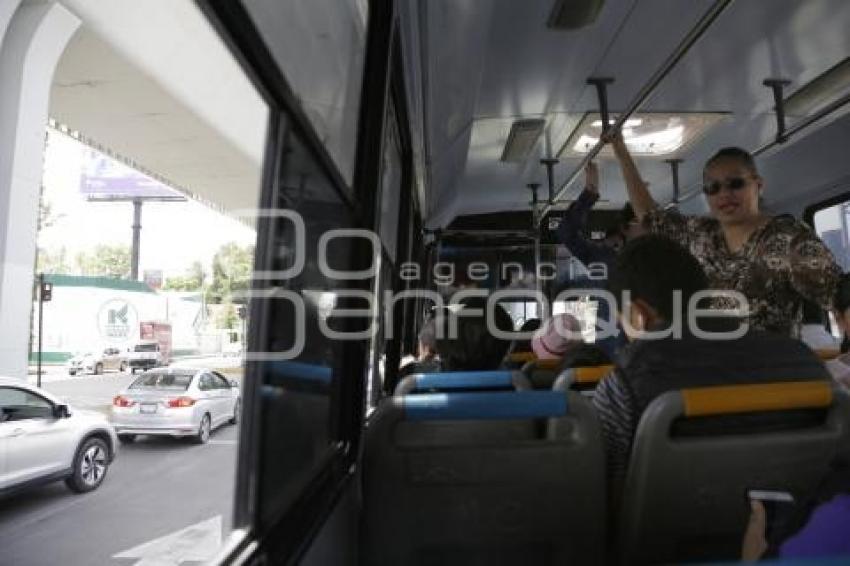 TRANSPORTE PÚBLICO . VIDRIOS POLARIZADOS