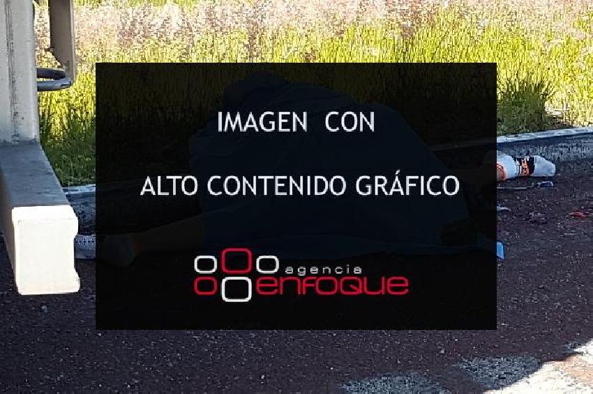 ASALTANTE MUERTO . AUTOPISTA