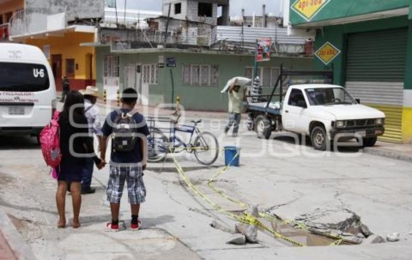 HUNDIMIENTO CALLE . ACATLÁN