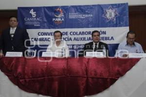 FIRMA CANIRAC . POLICÍA AUXILIAR