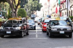 SERVICIOS DE TAXIS Y UBER