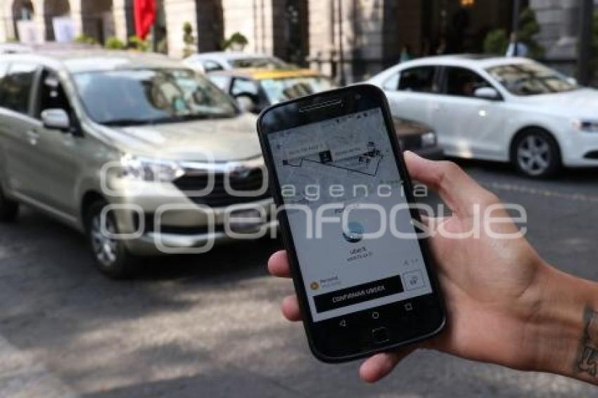 SERVICIOS DE TAXIS Y UBER