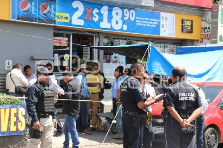 POLICÍA MUNICIPAL MUERTO . OXXO