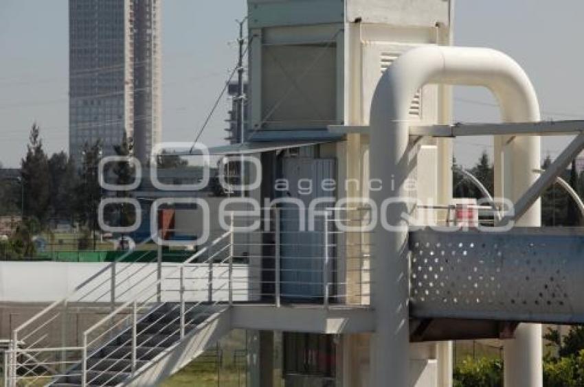 ELEVADOR . PUENTE PEATONAL