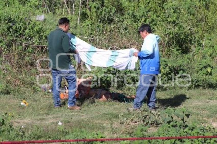 HOMICIDIO . SAN LORENZO ALMECATLA