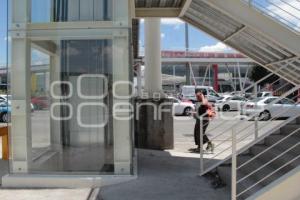 ELEVADOR . PUNTE PEATONAL