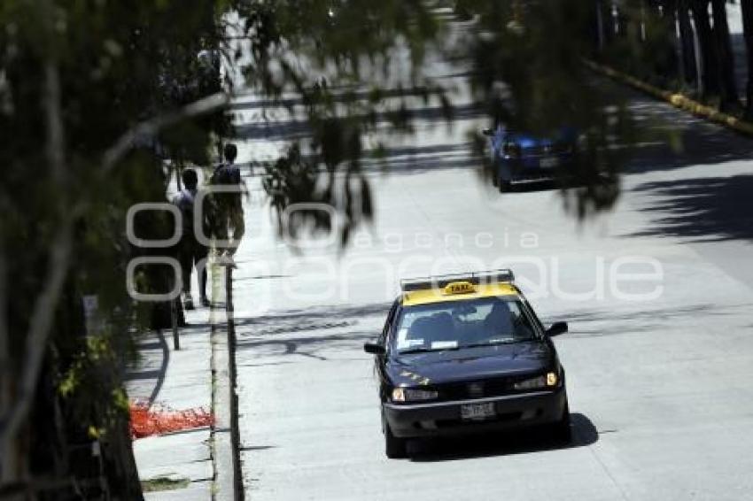 TRANSPORTE . TAXIS