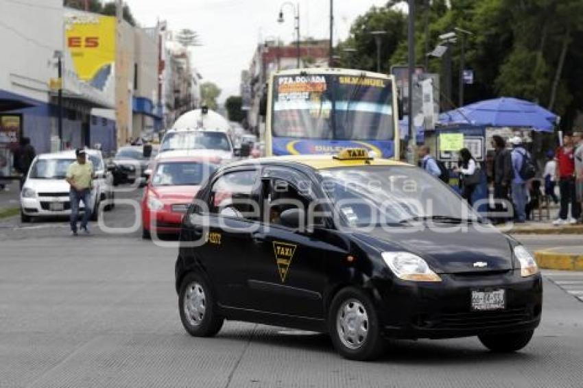 TRANSPORTE . TAXIS