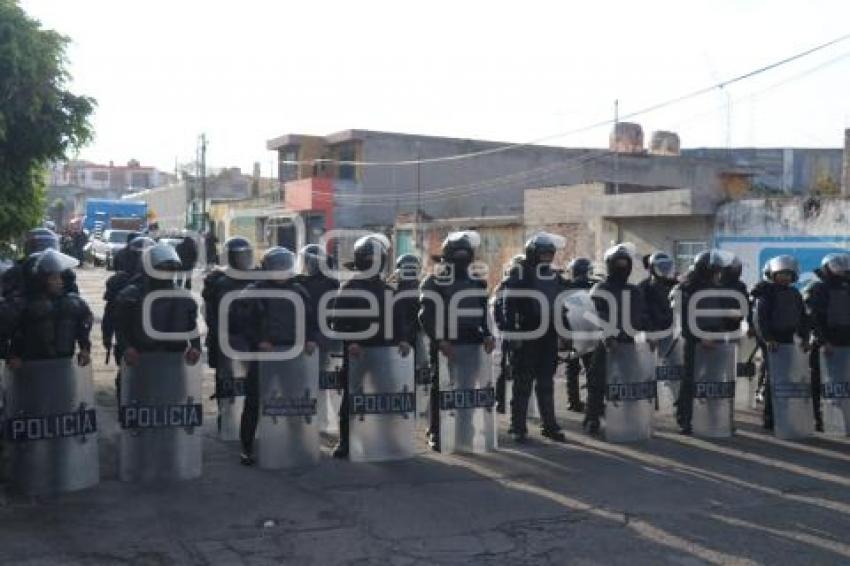 POLICÍA . DESALOJO