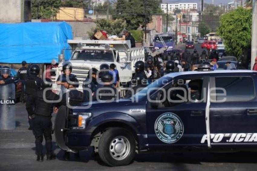 POLICÍA . DESALOJO