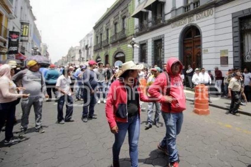 COMERCIANTES DE SAN MARTÍN TEXMELUCAN . MANIFESTACIÓN