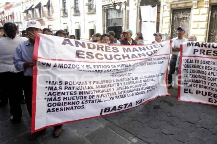 HABITANTES DE AMOZOC . MANIFESTACIÓN