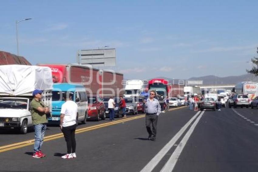 BLOQUEO CARRETERA CUACNOPALAN