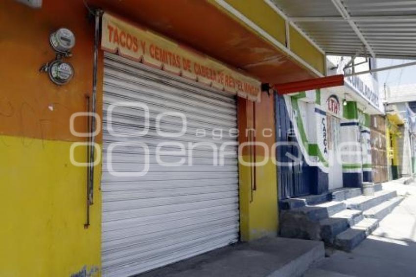 CIERRE DE COMERCIOS