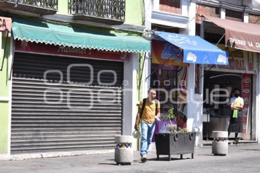 CIERRE DE COMERCIOS