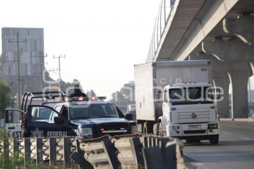 AUTOPISTA . DETENIDOS