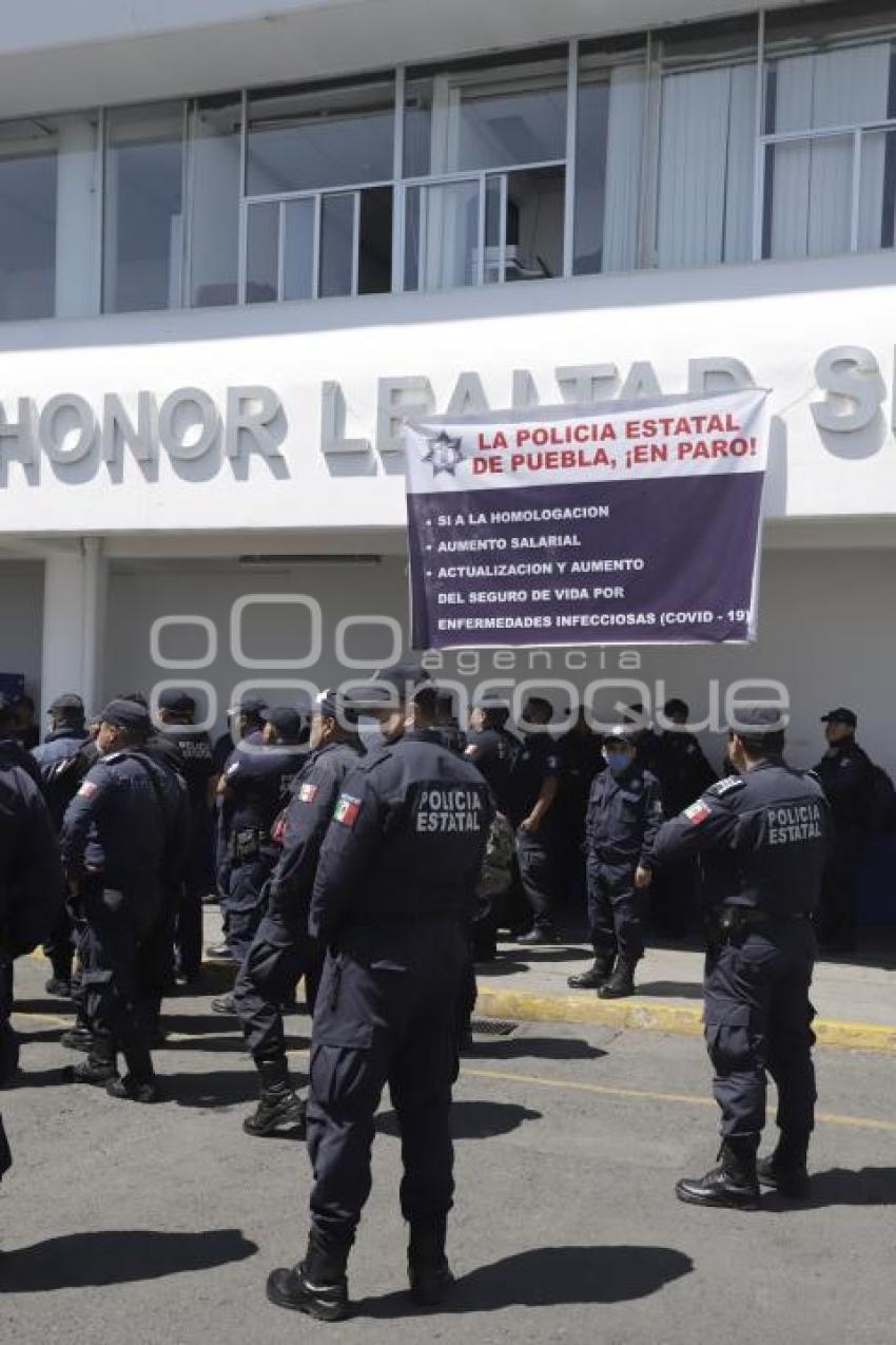 POLICÍA ESTATAL . MANIFESTACIÓN