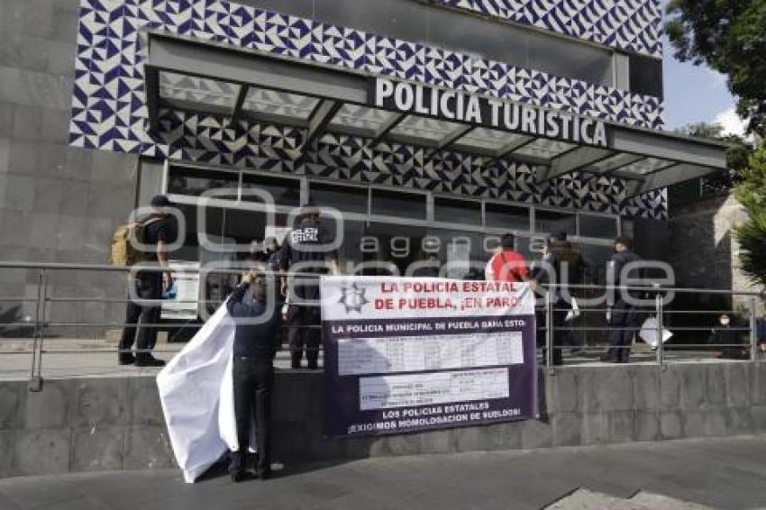 POLICÍA ESTATAL . MANIFESTACIÓN