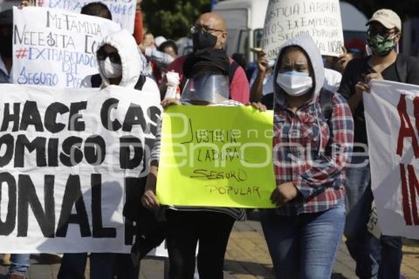 VISITA PRESIDENCIAL . MANIFESTACIÓN EXTRABAJADORES