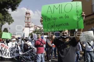 VISITA PRESIDENCIAL . MANIFESTACIÓN EXTRABAJADORES