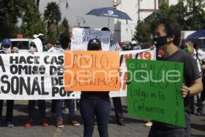 VISITA PRESIDENCIAL . MANIFESTACIÓN EXTRABAJADORES