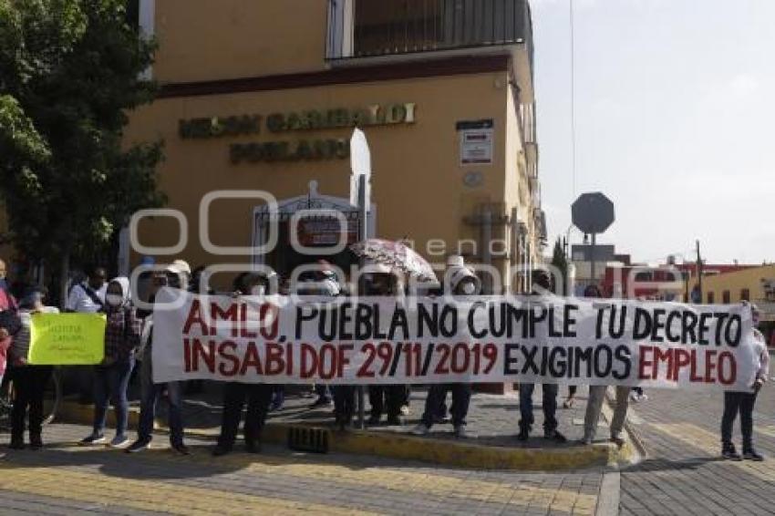 VISITA PRESIDENCIAL . MANIFESTACIÓN EXTRABAJADORES