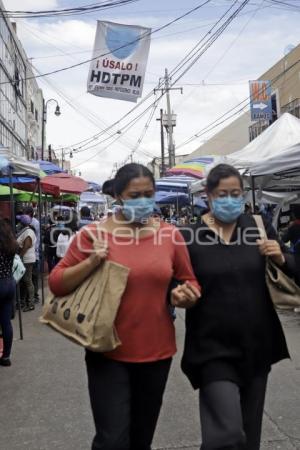 MERCADO 5 DE MAYO . LONA PREVENCIÓN