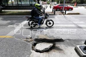 DAÑOS EN BANQUETA