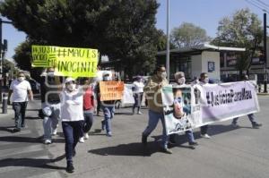 MANIFESTACIÓN CASO MAU