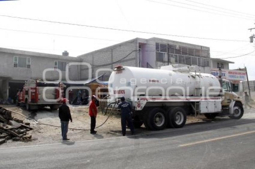 TEXMELUCAN . INCENDIO MAQUILADORA