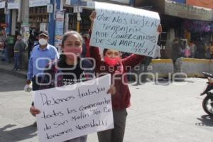 TEXMELUCAN . MANIFESTACIÓN VENDEDORES