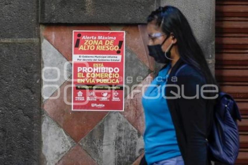 CARTELES . PROHIBICIÓN AMBULANTAJE