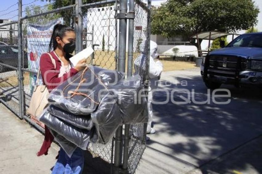 POLIDEPORTIVO XONACA . MIGRANTES