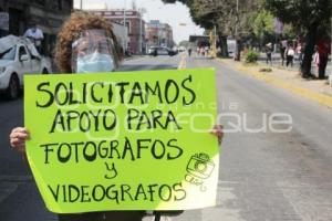 MANIFESTACIÓN . FOTÓGRAFOS Y VIDEÓGRAFOS