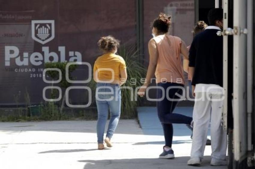 POLIDEPORTIVO XONACA . MIGRANTES