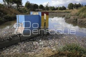 BASURA .  PUENTE NEGRO