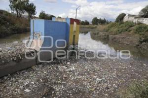 BASURA .  PUENTE NEGRO