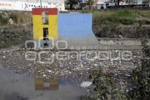 BASURA .  PUENTE NEGRO