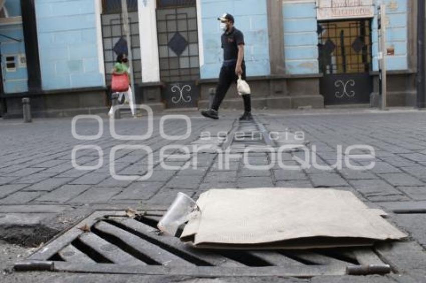 BASURA EN ALCANTARILLAS