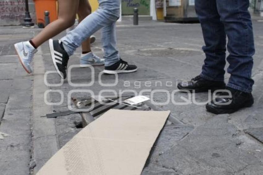 BASURA EN ALCANTARILLAS