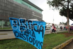 MANIFESTACIÓN . CUSTODIOS DETENIDOS