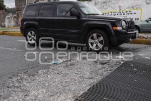 BACHE EN REJILLA DE ALCANTARILLA