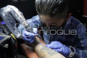 NIÑO TATUADOR