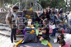 FEMINICIDIOS . OFRENDA