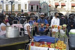 POLICÍA . RIÑA DE AMBULANTES